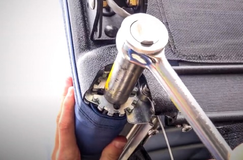 Close-up of ShoreStation Revolution canopy ratchet and lock system securing the cover